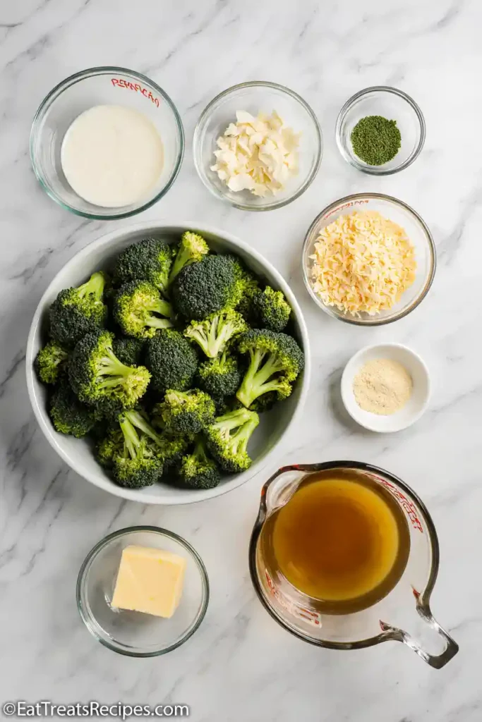 Ingredients for broccoli cheese crockpot soup on marble surface