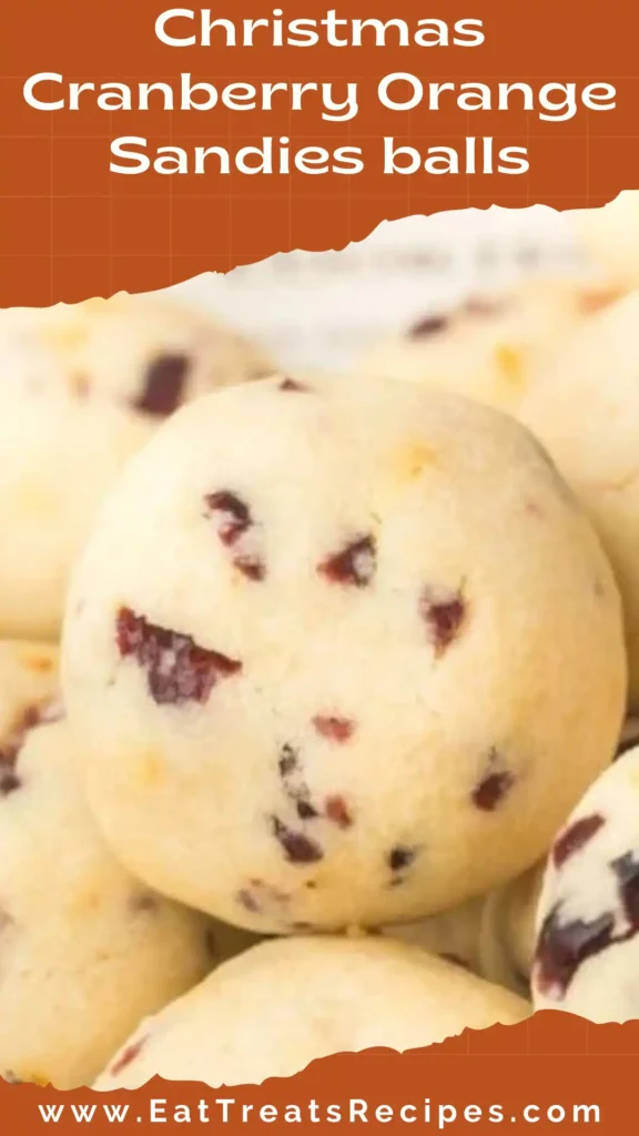 Christmas cranberry orange sandies balls on white marble