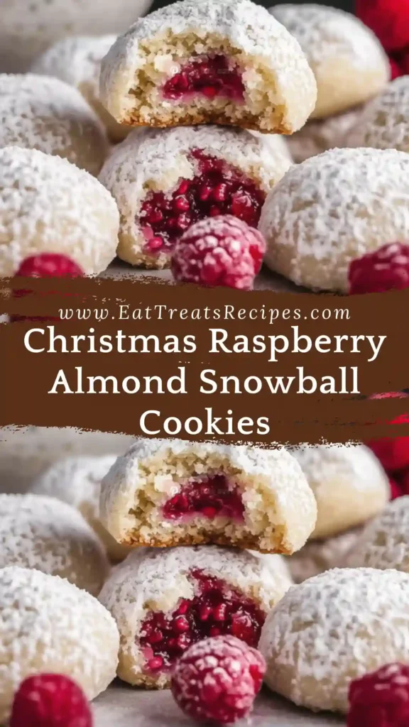 Christmas Raspberry Almond Snowball Cookies with raspberry filling and powdered sugar