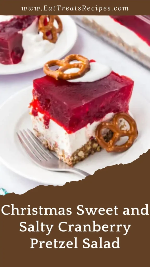Christmas sweet and salty cranberry pretzel salad slice on white marble