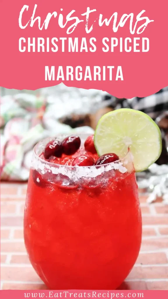 Christmas spiced margarita with cinnamon rim and rosemary