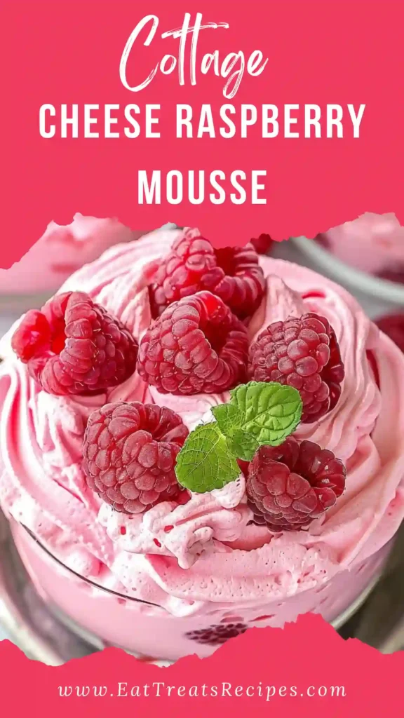 Cottage Cheese Raspberry Mousse served creamy and smooth in a glass on a white marble background