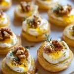 Simple puff pastry bites with fresh cheese topped with honey and walnuts