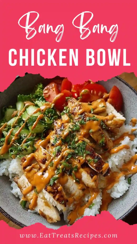 Bang Bang Chicken Bowl with tender chicken, spicy mayo sauce, and fresh vegetables on white marble
