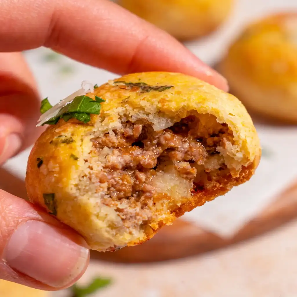 Garlic Parmesan Cheeseburger Bombs baked until golden and served warm