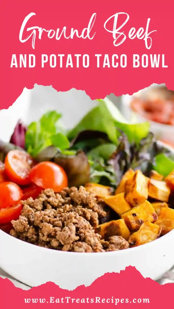Whole 30 ground beef and potato taco bowl with fresh vegetables on white marble background
