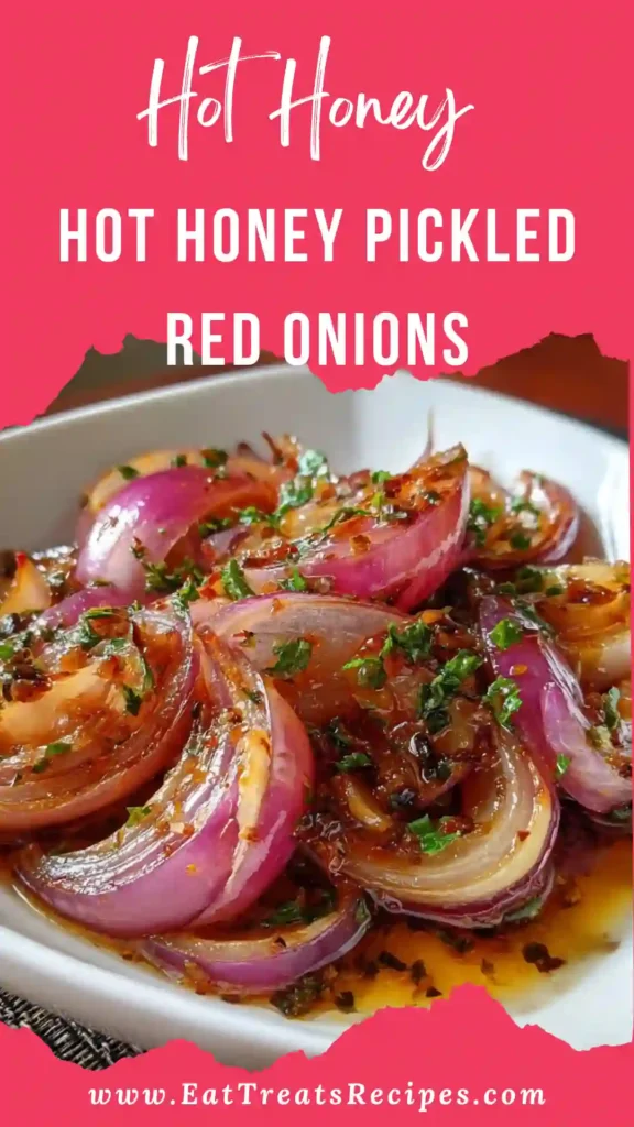 Hot Honey Pickled Red Onions in a glass jar with vibrant pink color