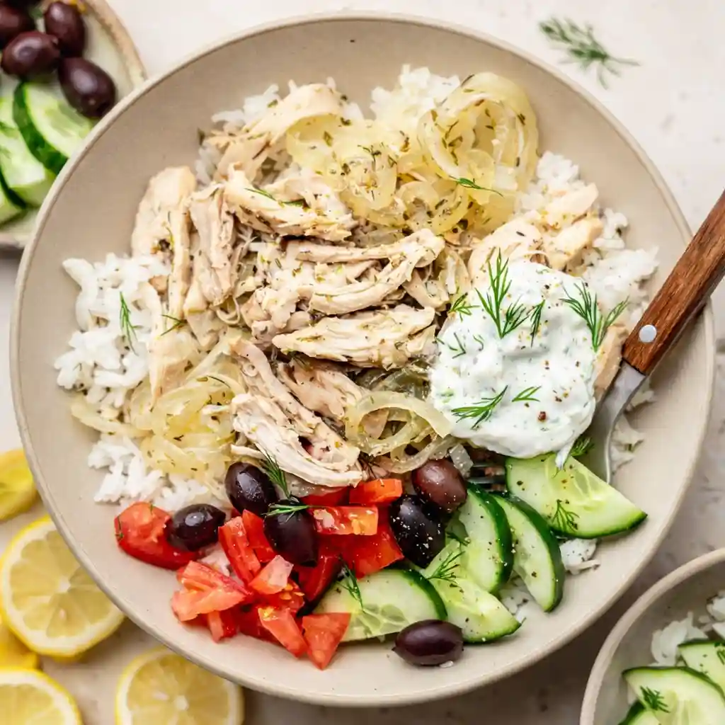 Slow Cooker Greek Chicken served warm in a cozy bowl