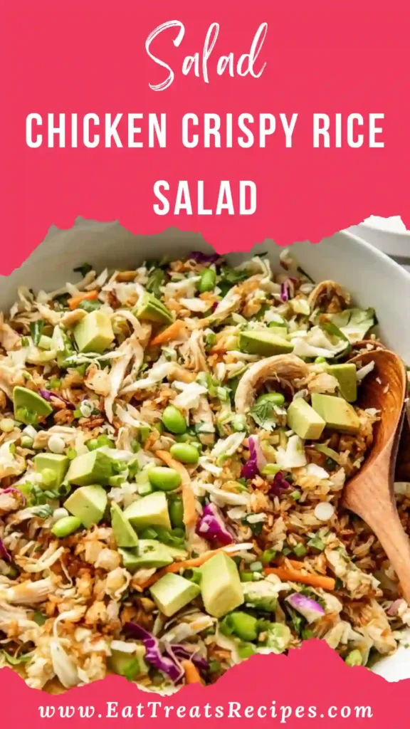 Chicken crispy rice salad in white bowl with golden crispy rice