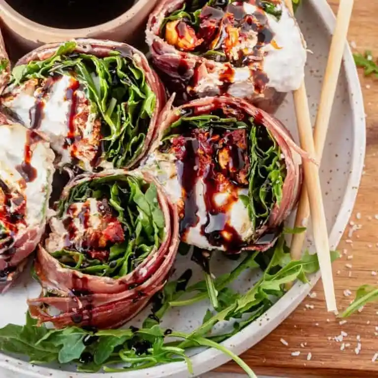 italian sushi recipe stored in meal prep container on marble surface