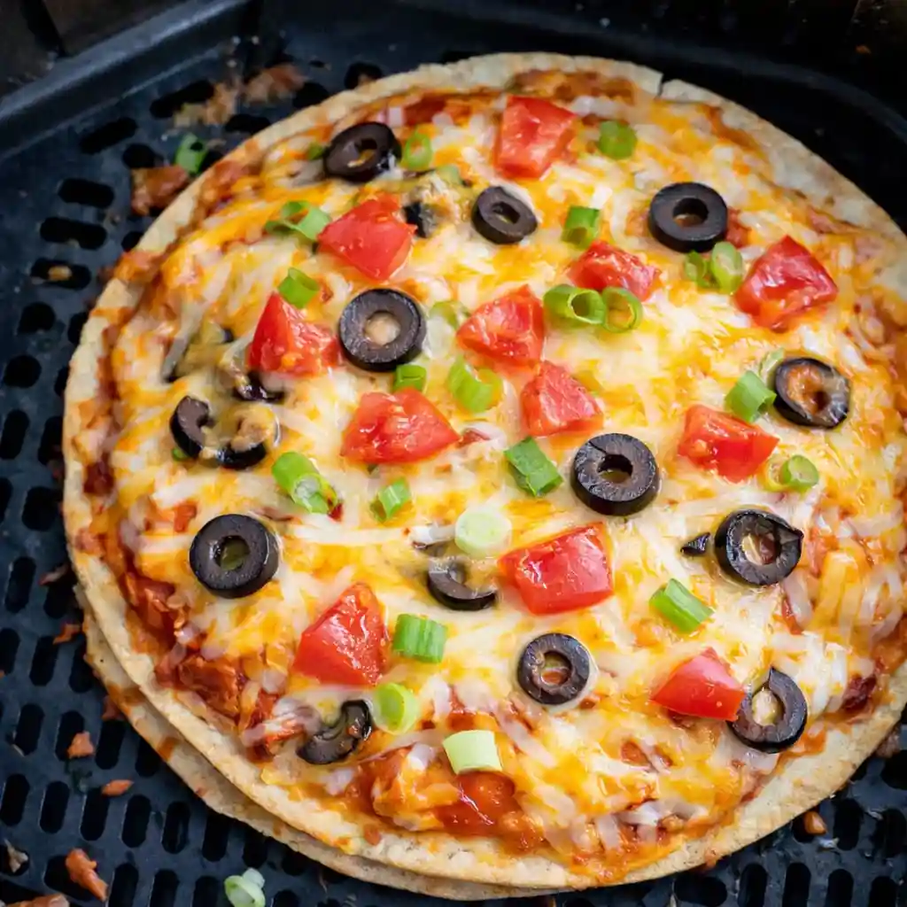 Crispy air fryer Mexican pizza recipe with beef and melted cheese