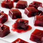 Cranberry Pomegranate Caramels on white plate