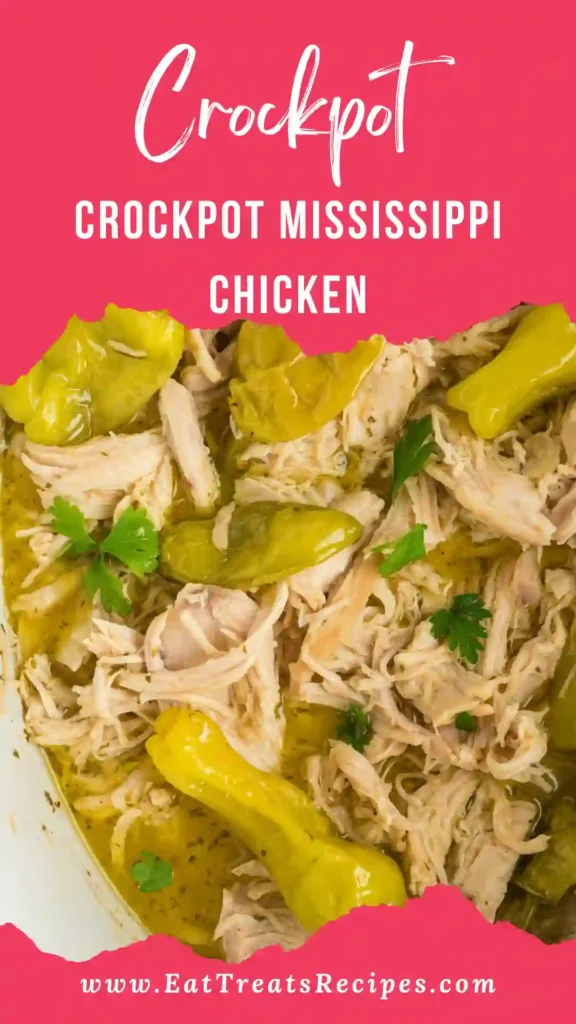 Crockpot Mississippi Chicken served in white bowl with pepperoncini and buttery ranch sauce