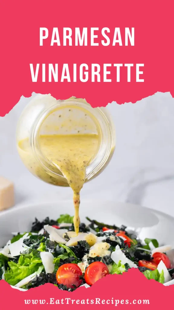 Homemade parmesan vinaigrette in glass jar on white marble surface