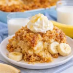 southern banana cobbler on holiday dessert table next to apple cobbler and peach cobbler