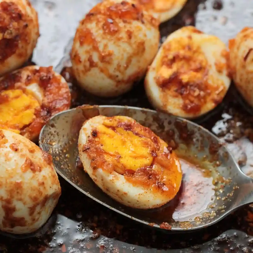 TikTok egg boil recipe stored in meal prep container on marble surface