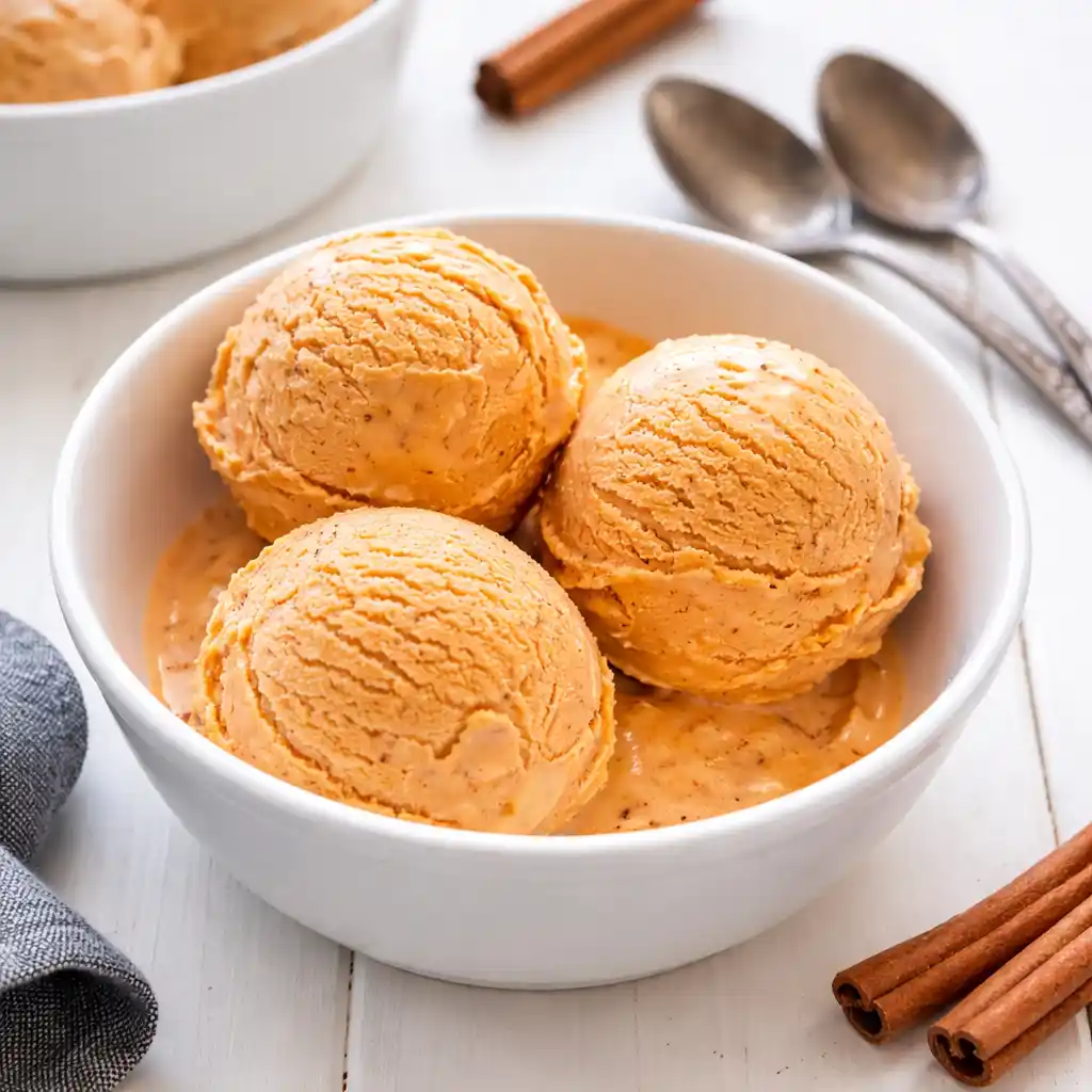 carrot cake ice cream scoop with cream cheese swirl