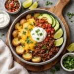 Loaded Fiesta Potato Bowls with crispy potatoes and melted cheese