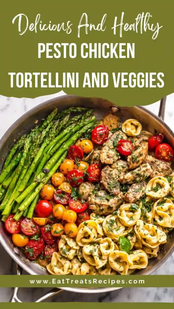Pesto chicken tortellini and veggies served in skillet with basil pesto sauce and colorful vegetables
