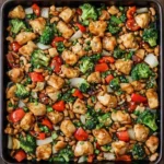 sheet pan cashew chicken with roasted vegetables and crunchy cashews