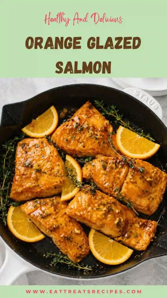 orange glazed salmon with glossy citrus sauce on plate