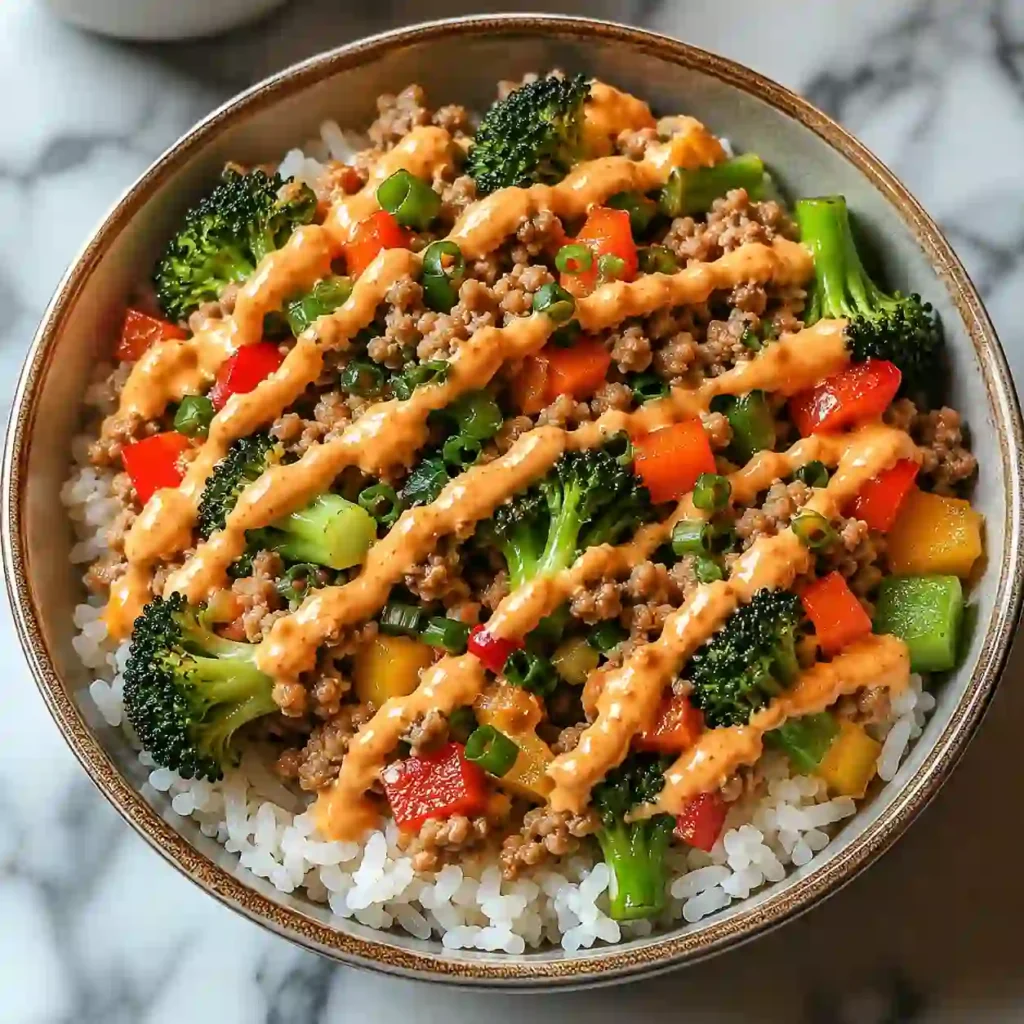 Bang Bang Ground Turkey Rice Bowl with fresh vegetables