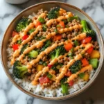 Bang Bang Ground Turkey Rice Bowl with fresh vegetables