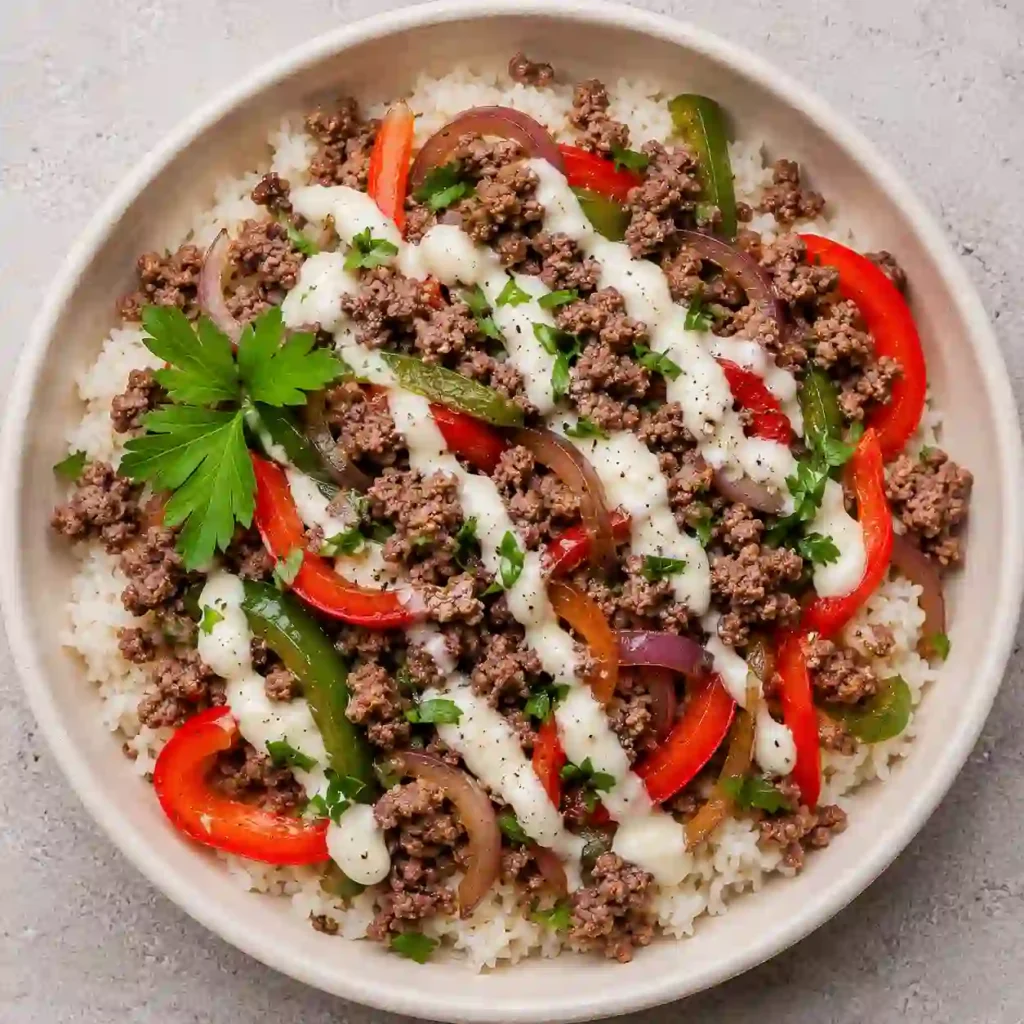 Ground Beef Philly Cheesesteak Bowl with provolone and vegetables