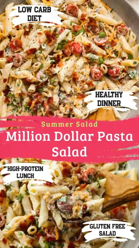 A wide ceramic bowl filled with traditional creamy million dollar pasta salad on a bright white marble background.